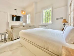 Llit o llits en una habitació de Charming Madrid Studio - Largas Estancias