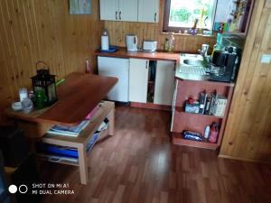 Køkken eller tekøkken på Domek letniskowy-Powidz ul.Topolowa + 3 billeder