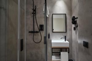 Ein Badezimmer in der Unterkunft Ella Hostel Ramblas