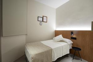 Ein Bett oder Betten in einem Zimmer der Unterkunft Ella Hostel Ramblas