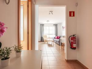 a view of a living room with a fire hydrant at Algaba planta Baja C in La Algaba