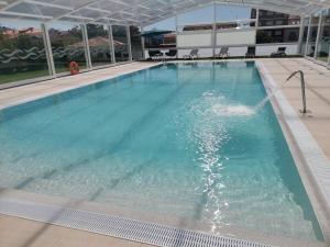 The swimming pool at or close to Apartamentos La Toja
