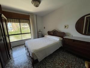 Łóżko lub łóżka w pokoju w obiekcie PV20A, Gran apartamento en el centro con vistas al mar