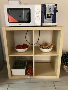 Η κουζίνα ή μικρή κουζίνα στο Monolocale Porta Napoli