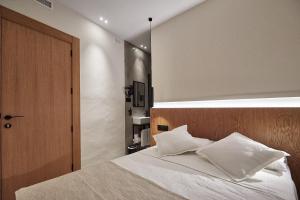 Ein Bett oder Betten in einem Zimmer der Unterkunft Ella Hostel Ramblas