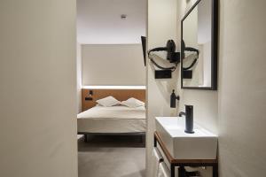 Ein Bett oder Betten in einem Zimmer der Unterkunft Ella Hostel Ramblas