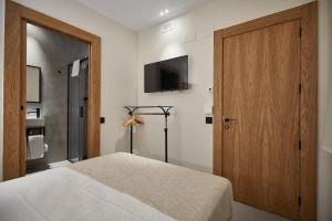 Ein Bett oder Betten in einem Zimmer der Unterkunft Ella Hostel Ramblas