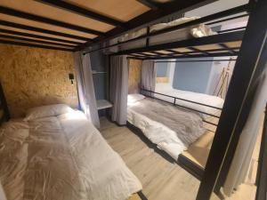 Letto o letti in una camera di 輕森嶼