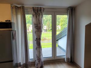 Kuchyň nebo kuchyňský kout v ubytování Apartamenty Wisła Lipowa 16-4D