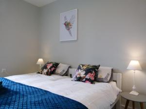 Posteľ alebo postele v izbe v ubytovaní Apartament BB z widokiem na Krynicę