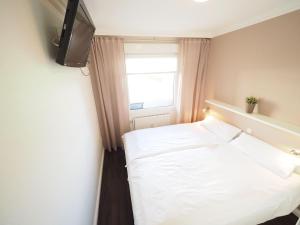Postel nebo postele na pokoji v ubytování Appartement-173