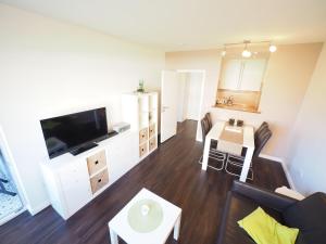 TV a/nebo společenská místnost v ubytování Appartement-173