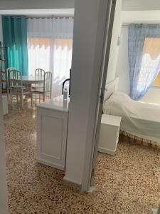 Łóżko lub łóżka w pokoju w obiekcie Mariola