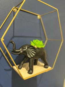 a figurine of an elephant on a shelf at Elite 60 Stays in Newcastle upon Tyne