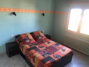 Posteľ alebo postele v izbe v ubytovaní Tartana