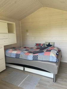 Ein Bett oder Betten in einem Zimmer der Unterkunft Pomonahouse