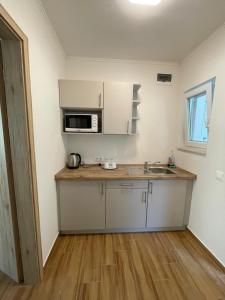 Cucina o angolo cottura di Liget Üdülőpark Fonyód