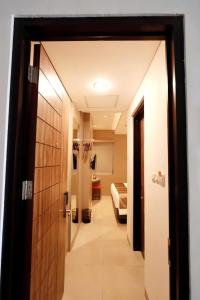 Voodi või voodid majutusasutuse Hayo Hotel Palembang toas