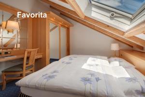 Postel nebo postele na pokoji v ubytování Swissflair Apartments