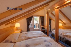 Postel nebo postele na pokoji v ubytování Swissflair Apartments
