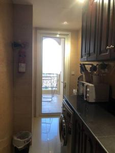 Kuchyň nebo kuchyňský kout v ubytování Two bedroom apartment - Great sea views - Alhamra Village