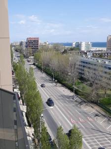 a view of a city street with cars on the road at Ada Luxury Apartments 43 in Mamaia