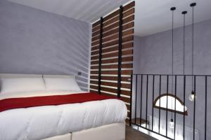 Posteľ alebo postele v izbe v ubytovaní Quaint Boutique Hotel Nadur