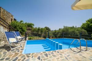 The swimming pool at or close to Villa Zoi Tzitzifes