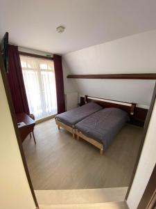 Katil atau katil-katil dalam bilik di Vakantiecentrum Zeelinde