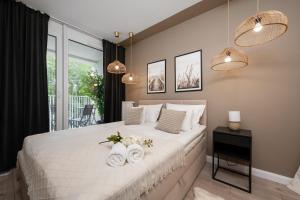 Posteľ alebo postele v izbe v ubytovaní Apartment Wrocław Braniborska by Noclegi Renters