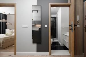 Kúpeľňa v ubytovaní Apartment Wrocław Braniborska by Noclegi Renters