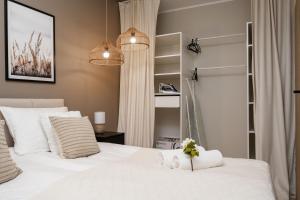 Posteľ alebo postele v izbe v ubytovaní Apartment Wrocław Braniborska by Noclegi Renters + 11 fotografií