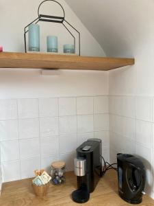 Cucina o angolo cottura di Rustig appartement in het groen met terras
