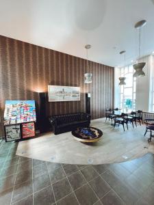 Posezení v ubytování Alpha Hotel + 37 fotografií
