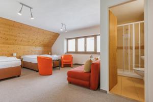 Postel nebo postele na pokoji v ubytování Hotel Rusava
