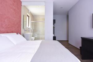 Posteľ alebo postele v izbe v ubytovaní Quaint Boutique Hotel Nadur