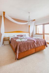 Postel nebo postele na pokoji v ubytování Hotel Rusava