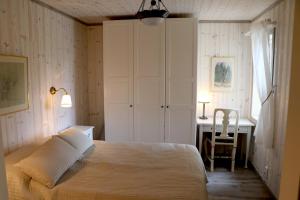 Ein Bett oder Betten in einem Zimmer der Unterkunft Fjällhus i Funäsdalen