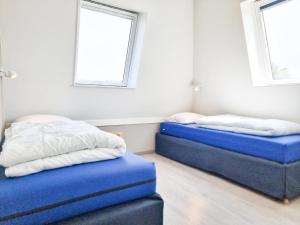 Un ou plusieurs lits dans un hébergement de l'établissement Vakantiehuis aan de duinen Vlissingen VL20