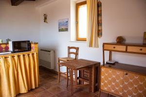 Kuchyň nebo kuchyňský kout v ubytování La Casa Ocra Suite