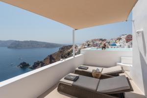 a balcony with a view of the ocean at Aspaki by Art Maisons in Oia