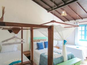Poschodová posteľ alebo postele v izbe v ubytovaní Casa com wifi e churrasqueira na Praia do Espelho