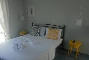 Postel nebo postele na pokoji v ubytování Allegria Family Hotel