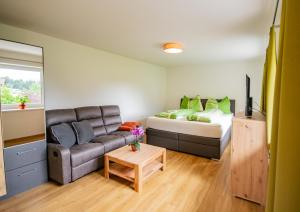 A bed or beds in a room at Cafe Max 2