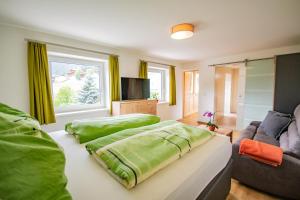 A bed or beds in a room at Cafe Max 2