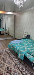 Voodi või voodid majutusasutuse 1-комнатная квартира toas