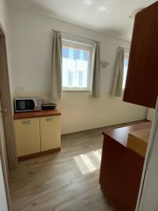 Kuchnia lub aneks kuchenny w obiekcie Apartman Varea