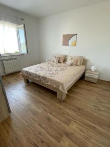 Postel nebo postele na pokoji v ubytování Apartman Varea