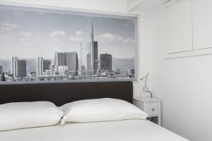 Nest for 2 in Milan Fashion District tesisinde bir odada yatak veya yataklar