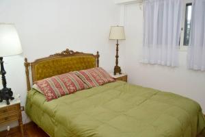 Postel nebo postele na pokoji v ubytování San Benito 1538 by depptö